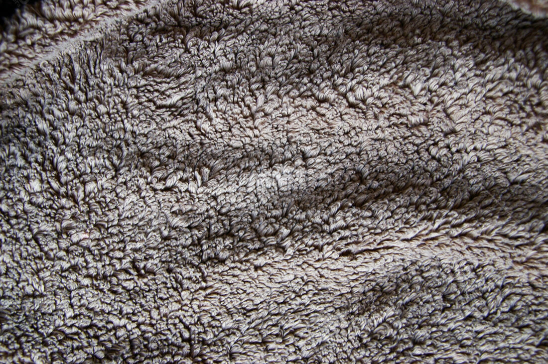 Textura de tecido felpudo marrom e cinza